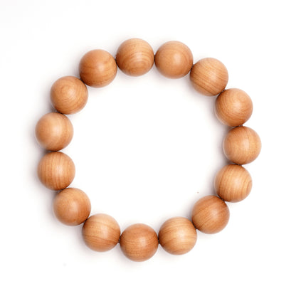 Wooden beaded bracelet on a white background