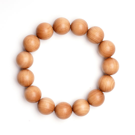 Wooden beaded bracelet on a white background